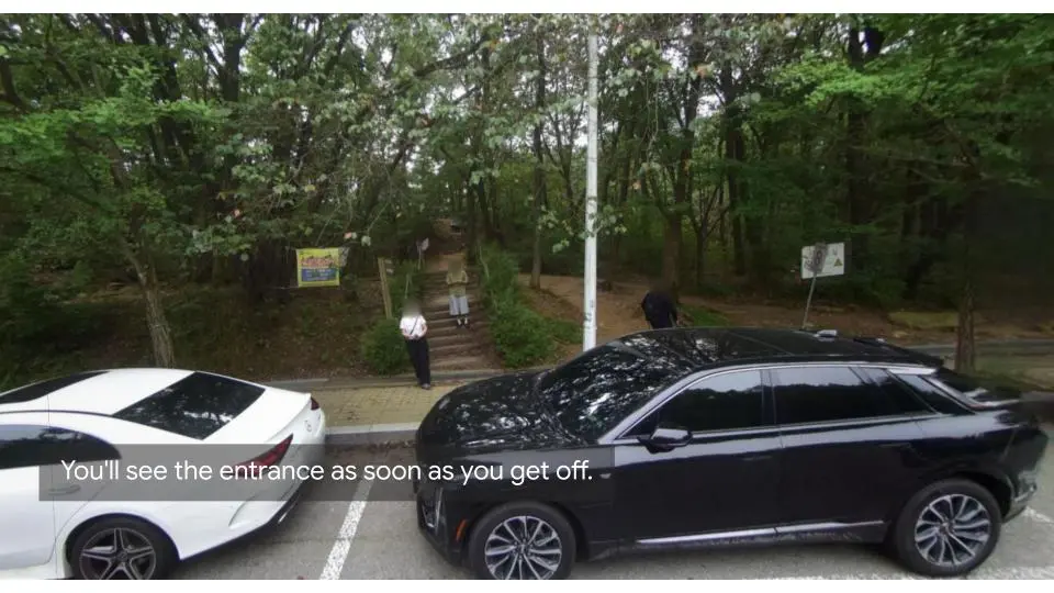 Parking lot entrance to Gwanaksan trail after bus arrival at SNU