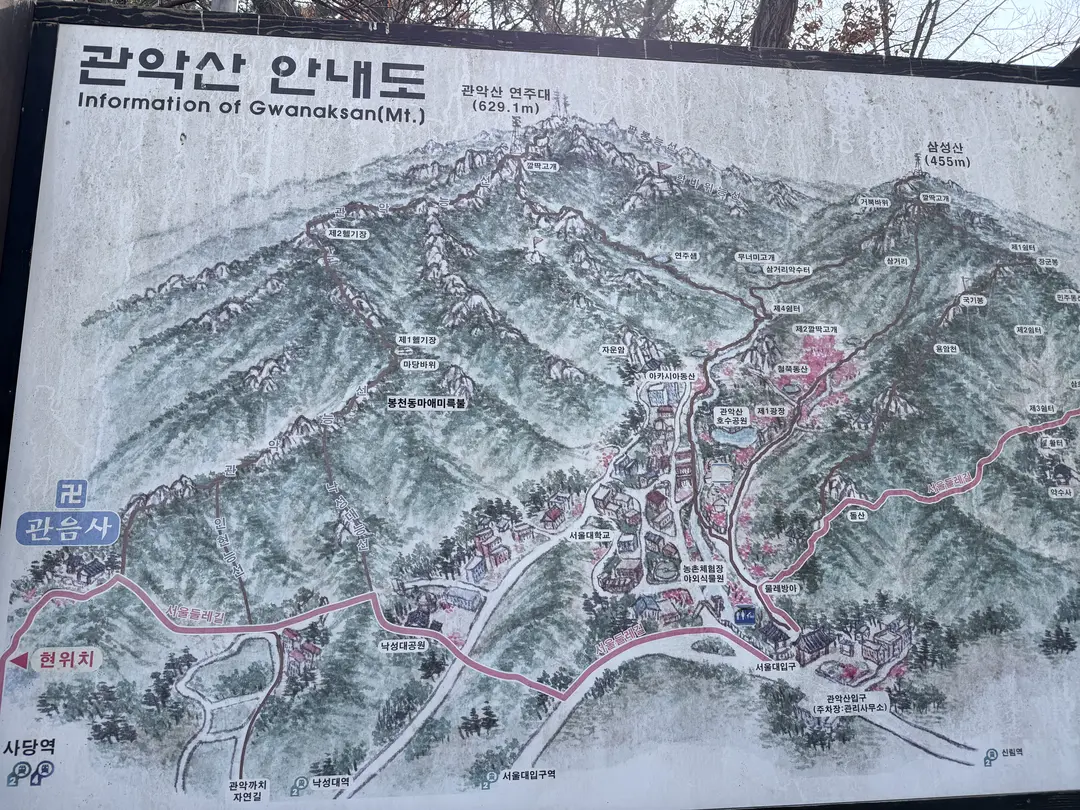 Gwanaksan mountain topographic map with hiking trails marked in pink