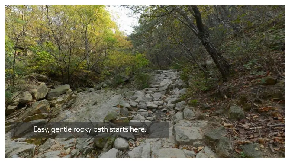 Rocky hiking trail entrance at SNU Gwanaksan trailhead with gentle path