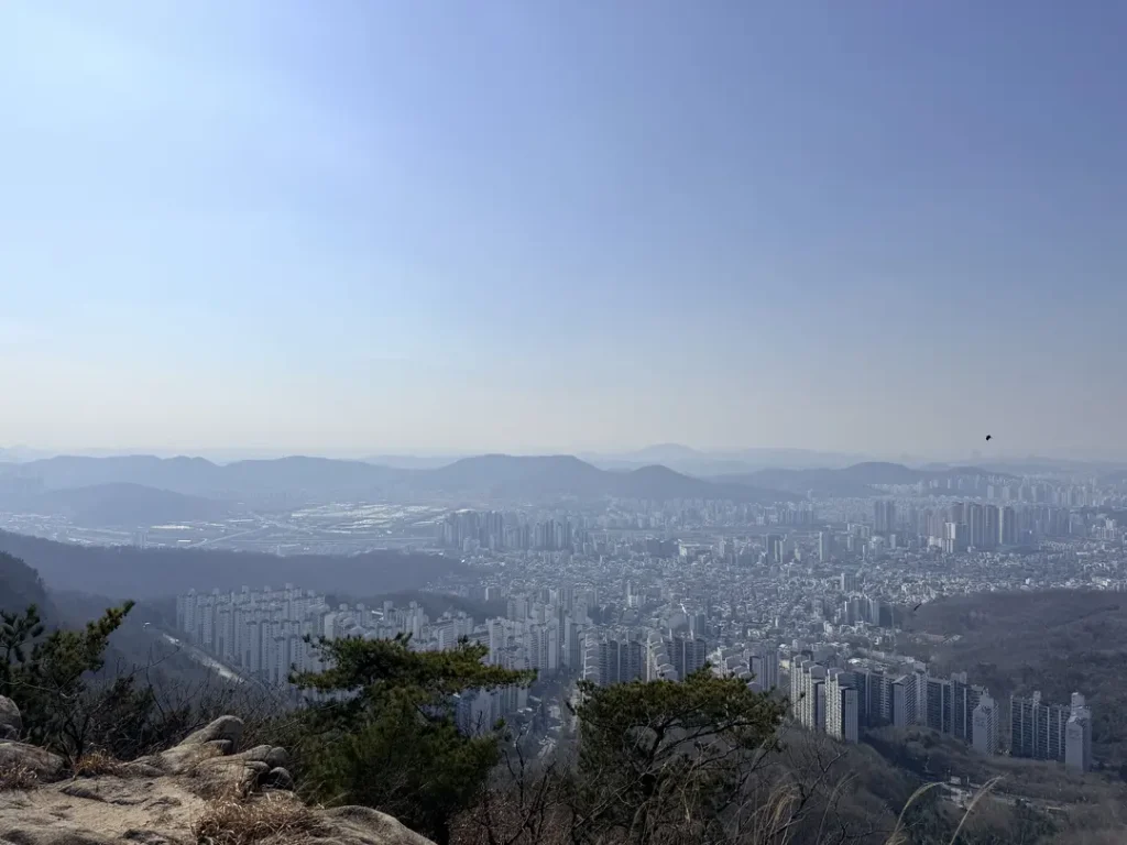 Panoramic view of Seoul cityscape from Hoamsan Mountain summit