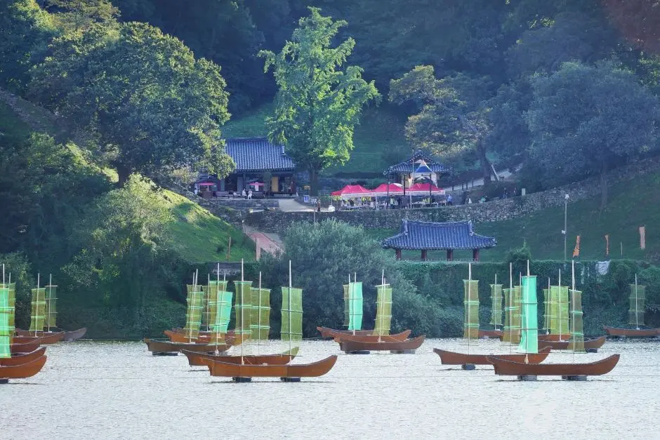 Traditional Korean boats with green sails at Baekje Cultural Festival