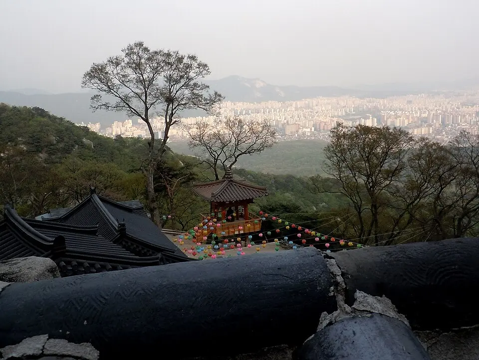 Traditional Korean temple with city skyline view from Dobongsan mountain