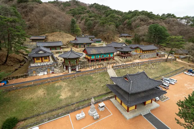 Aerial view of Guryongsa Temple complex set in forested mountains