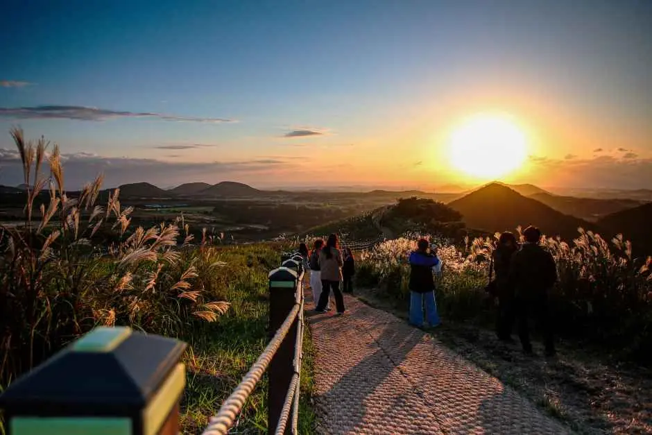 Sunset view from Saebyeol Oreum hiking trail with volcanic cone